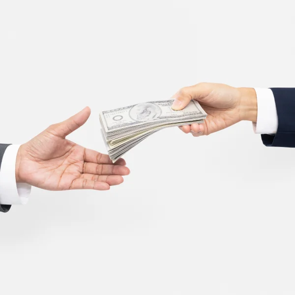 Businessman handing cash to a woman against a white background, symbolizing a private lending transaction.